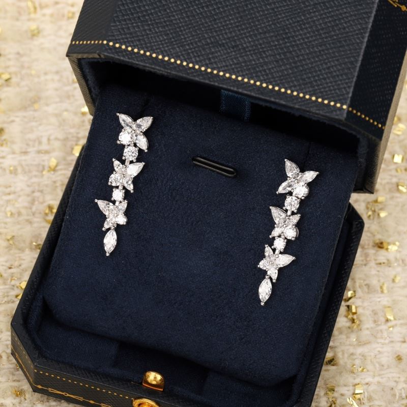 T*f*ny earrings
